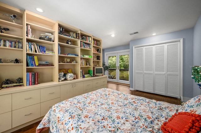 bedroom with recessed lighting, visible vents, access to exterior, and wood finished floors