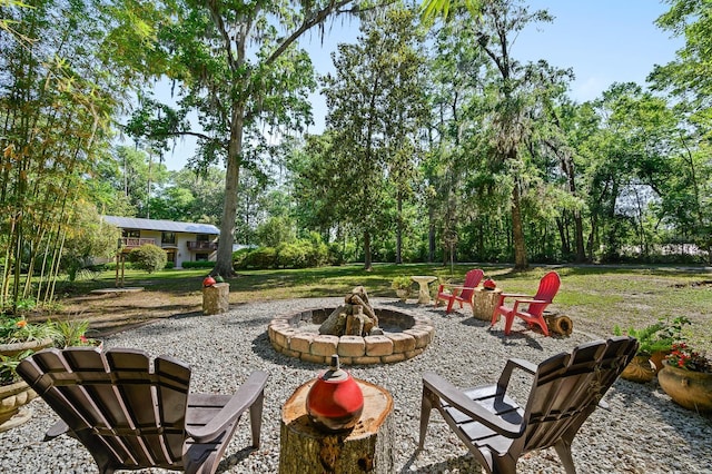 view of yard featuring a fire pit