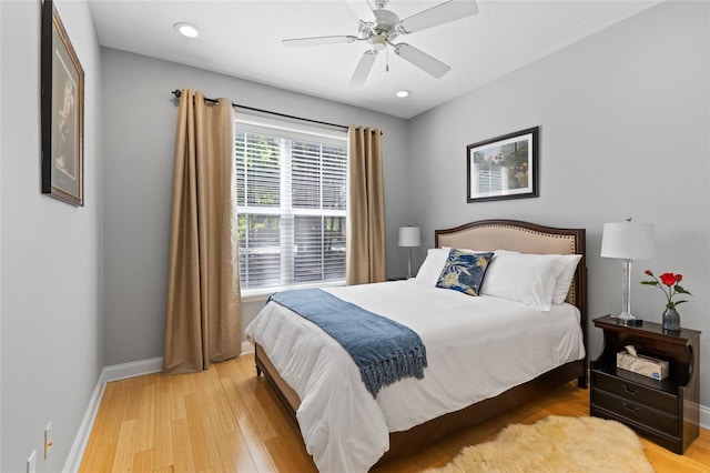 4073 SW 21st Ter, Gainesville, FL 32608 - bedroom with a ceiling fan, baseboards, recessed lighting, and light wood-style floors