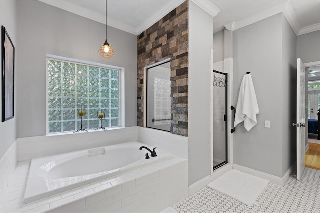 4073 SW 21st Ter, Gainesville, FL 32608 - bathroom with crown molding, a garden tub, baseboards, and a stall shower