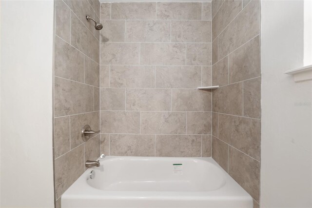 full bath featuring shower / washtub combination