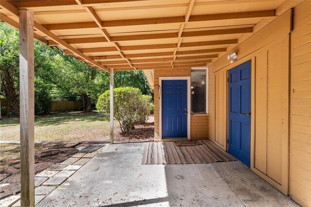 view of patio / terrace featuring fence