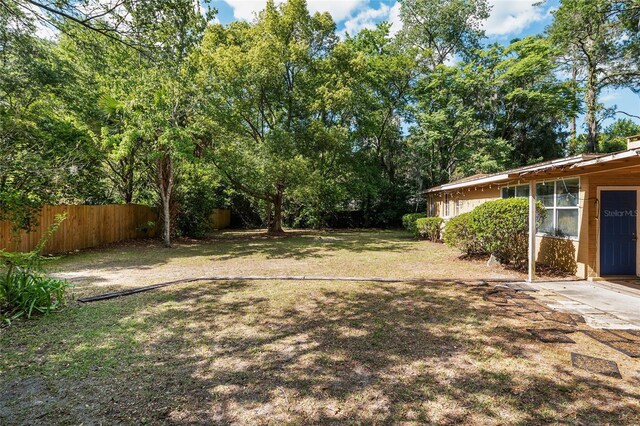 view of yard featuring fence