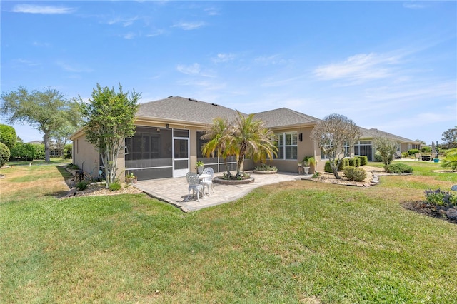 7274 SW 95th Ave, Ocala, FL 34481 - back of property with a lawn, a patio, a sunroom, and stucco siding