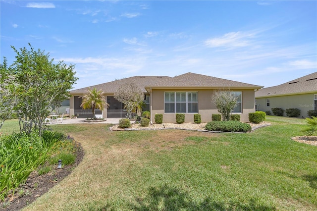 7274 SW 95th Ave, Ocala, FL 34481 - back of house with a lawn and stucco siding