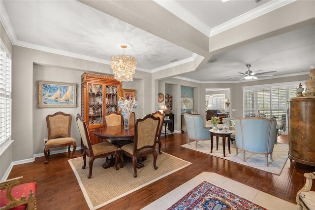 7274 SW 95th Ave, Ocala, FL 34481 - dining room with baseboards, ornamental molding, ceiling fan with notable chandelier, and hardwood / wood-style floors