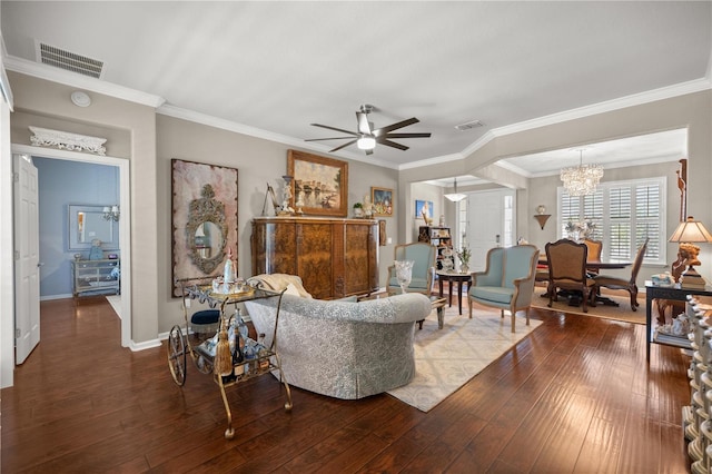 7274 SW 95th Ave, Ocala, FL 34481 - living area with visible vents, crown molding, hardwood / wood-style floors, baseboards, and ceiling fan with notable chandelier