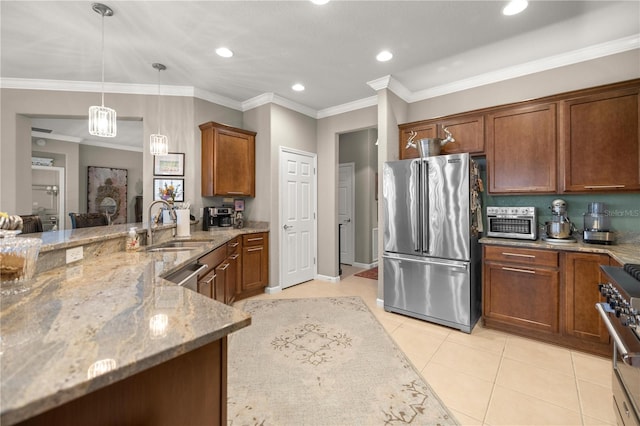 7274 SW 95th Ave, Ocala, FL 34481 - kitchen with decorative light fixtures, a sink, light stone counters, light tile patterned floors, and stainless steel appliances