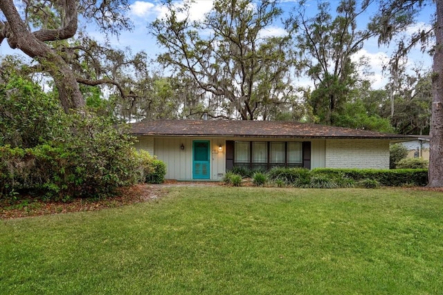 3925 NW 35th Pl, Gainesville, FL 32606 - single story home with a front yard