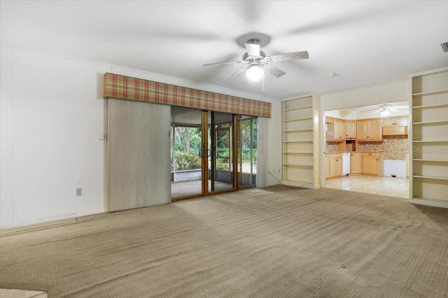3925 NW 35th Pl, Gainesville, FL 32606 - unfurnished living room with ceiling fan, visible vents, and carpet