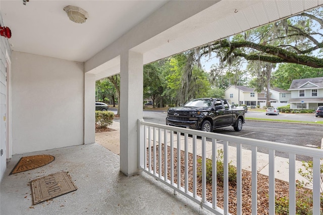4586 SW 48th Way Unit 106, Gainesville, FL 32608 - view of patio featuring a residential view