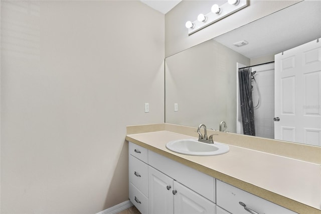 4586 SW 48th Way Unit 106, Gainesville, FL 32608 - bathroom with vanity and curtained shower