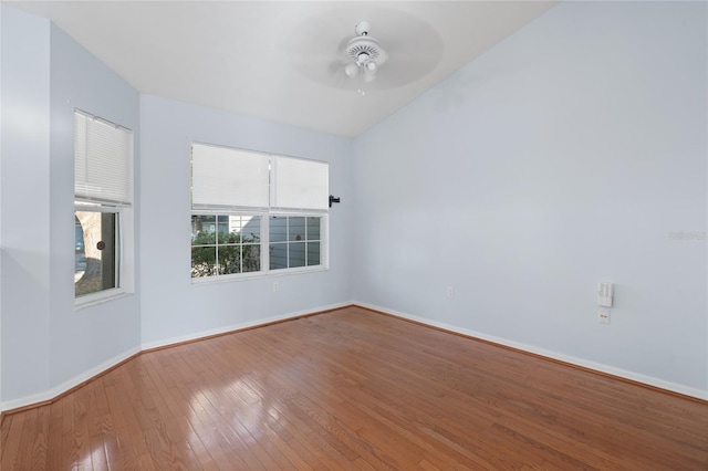 1017 NW 87th Way, Gainesville, FL 32606 - spare room with baseboards, ceiling fan, and hardwood / wood-style flooring
