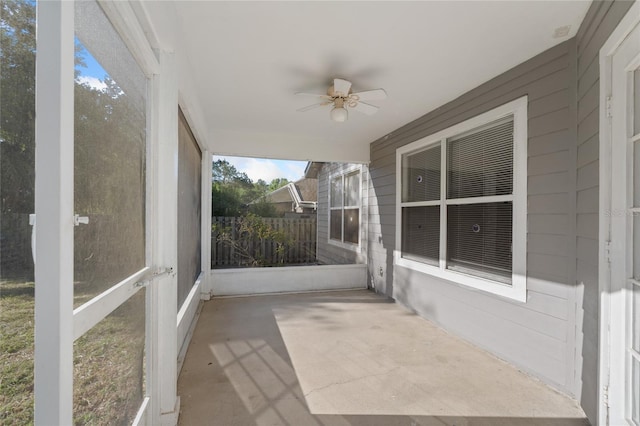 1017 NW 87th Way, Gainesville, FL 32606 - unfurnished sunroom featuring a ceiling fan