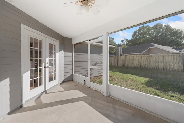 1017 NW 87th Way, Gainesville, FL 32606 - unfurnished sunroom with french doors, a ceiling fan, and plenty of natural light