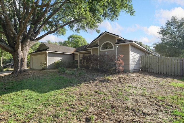 1017 NW 87th Way, Gainesville, FL 32606 - single story home featuring fence, an attached garage, and a front lawn