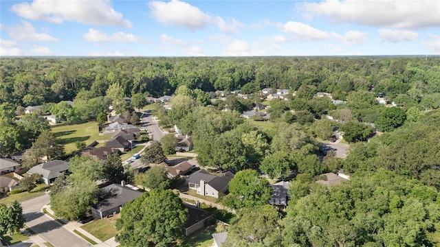 1017 NW 87th Way, Gainesville, FL 32606 - aerial view featuring a view of trees and a residential view