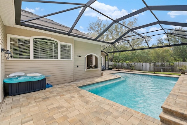 8815 SW 11th Ave, Gainesville, FL 32607 - view of swimming pool with a fenced in pool, fence, glass enclosure, and a patio area