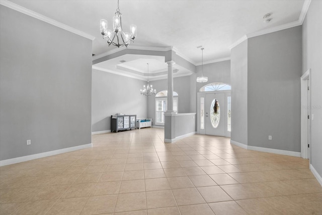 8815 SW 11th Ave, Gainesville, FL 32607 - interior space with crown molding, baseboards, a high ceiling, a chandelier, and light tile patterned floors