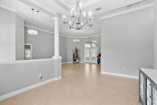 8815 SW 11th Ave, Gainesville, FL 32607 - entryway with visible vents, crown molding, light tile patterned floors, and a notable chandelier