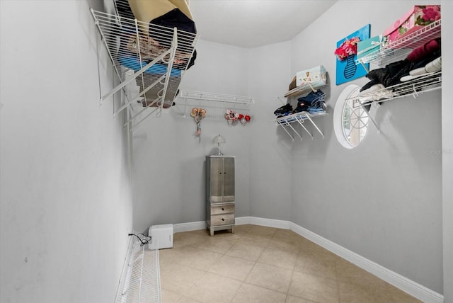 8815 SW 11th Ave, Gainesville, FL 32607 - spacious closet featuring tile patterned floors
