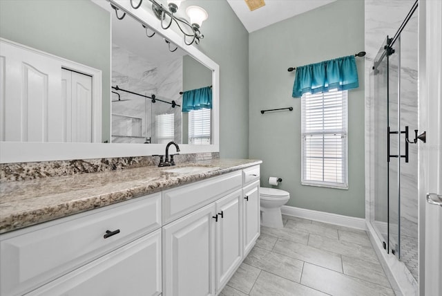 8815 SW 11th Ave, Gainesville, FL 32607 - bathroom featuring a stall shower, vanity, baseboards, toilet, and marble finish floor
