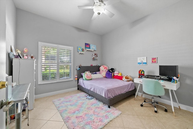 8815 SW 11th Ave, Gainesville, FL 32607 - bedroom featuring tile patterned floors, ceiling fan, baseboards, and vaulted ceiling