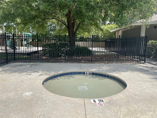 8815 SW 11th Ave, Gainesville, FL 32607 - view of swimming pool featuring fence and playground community