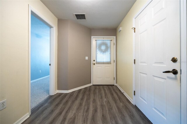 6355 NW 106th Pl, Alachua, FL 32615 - interior space with visible vents, baseboards, and dark wood-style floors