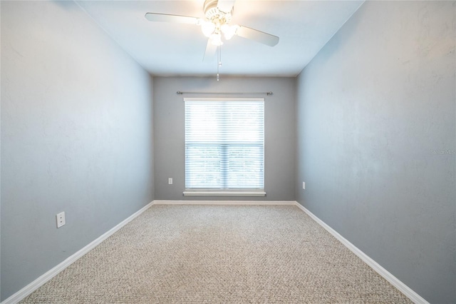 6355 NW 106th Pl, Alachua, FL 32615 - carpeted empty room with baseboards and ceiling fan