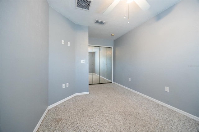 6355 NW 106th Pl, Alachua, FL 32615 - unfurnished bedroom featuring carpet floors, baseboards, visible vents, and a closet