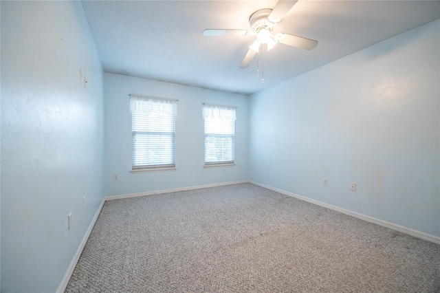 6355 NW 106th Pl, Alachua, FL 32615 - spare room featuring baseboards, carpet, and a ceiling fan