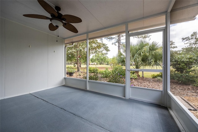 6355 NW 106th Pl, Alachua, FL 32615 - unfurnished sunroom with plenty of natural light and a ceiling fan