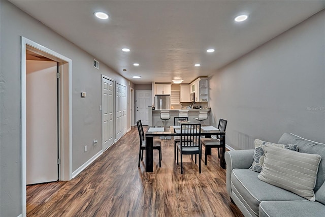 105 SE 16th Ave Unit N103, Gainesville, FL 32601 - dining room featuring recessed lighting and dark wood-style floors