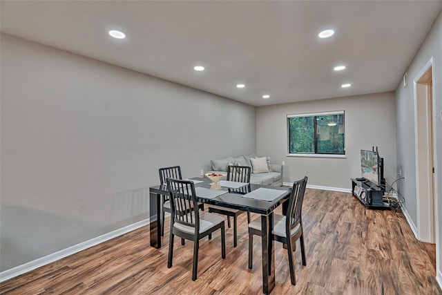 105 SE 16th Ave Unit N103, Gainesville, FL 32601 - dining area with wood finished floors and recessed lighting