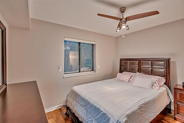 105 SE 16th Ave Unit N103, Gainesville, FL 32601 - bedroom featuring wood finished floors and ceiling fan