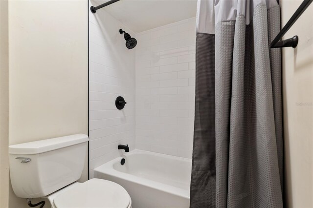 1612 NW 19th Cir, Gainesville, FL 32605 - bathroom with shower / bath combination with curtain and toilet