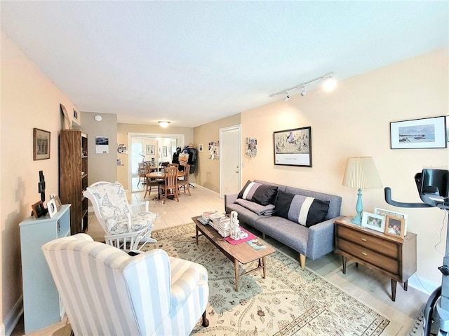 living room featuring rail lighting