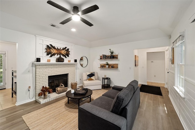 4511 SW 83rd Dr, Gainesville, FL 32608 - living room featuring a brick fireplace, ceiling fan, wood finished floors, baseboards, and recessed lighting
