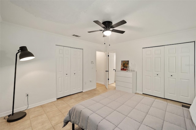 4511 SW 83rd Dr, Gainesville, FL 32608 - bedroom featuring ornamental molding, baseboards, light tile patterned floors, and ceiling fan