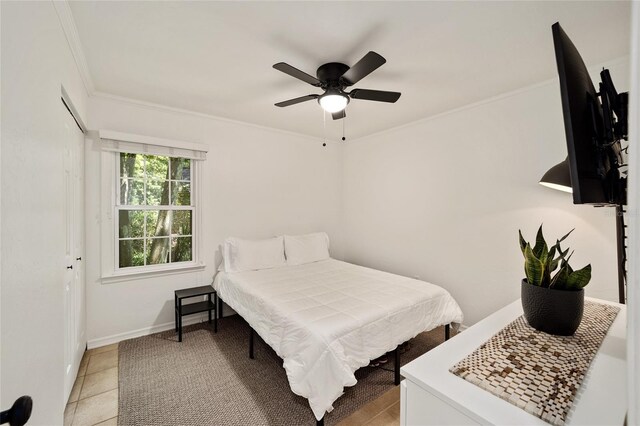 4511 SW 83rd Dr, Gainesville, FL 32608 - bedroom featuring crown molding, baseboards, and a ceiling fan