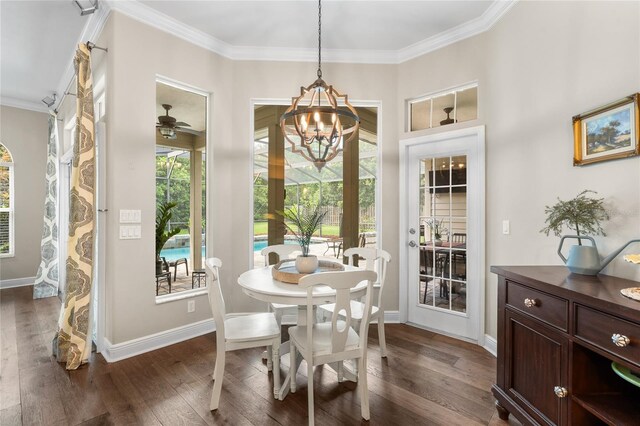 dining area with baseboards, ornamental molding, and dark wood-style flooring
