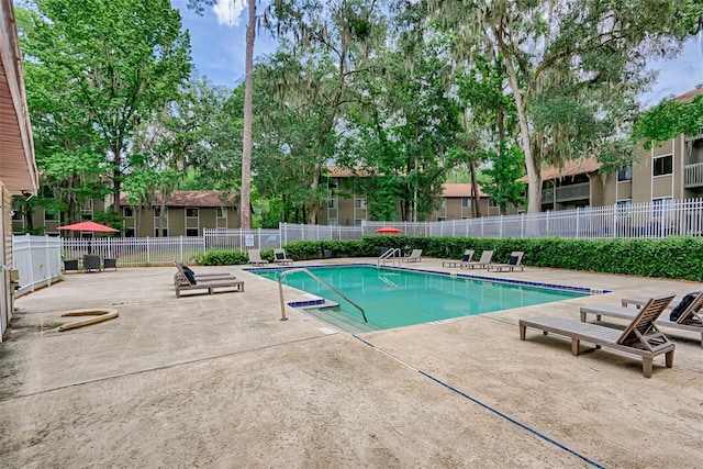 111 SE 16th Ave Unit O304, Gainesville, FL 32601 - community pool with a patio area