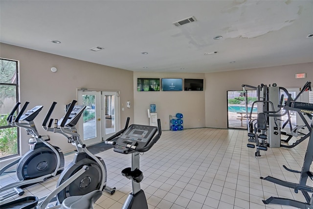 111 SE 16th Ave Unit O304, Gainesville, FL 32601 - gym featuring french doors and recessed lighting