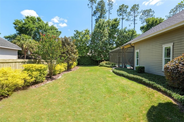 view of yard featuring fence