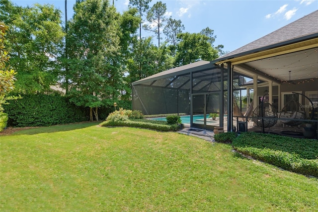 view of yard with an outdoor pool
