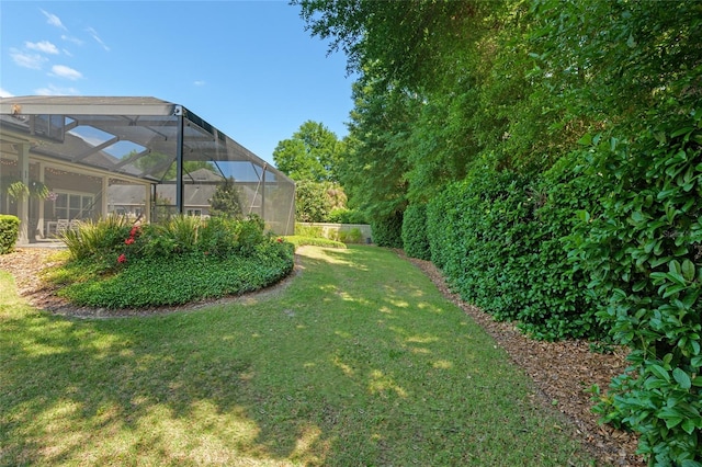 view of yard featuring a lanai