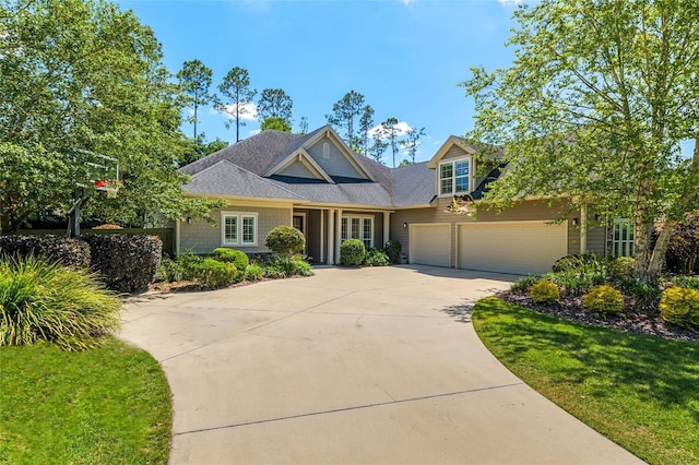 view of front facade with an attached garage and concrete driveway