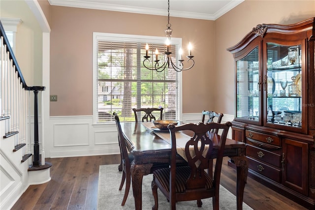 4515 SW 97th Ter, Gainesville, FL 32608 - dining area with stairway, a chandelier, dark wood-style floors, plenty of natural light, and wainscoting