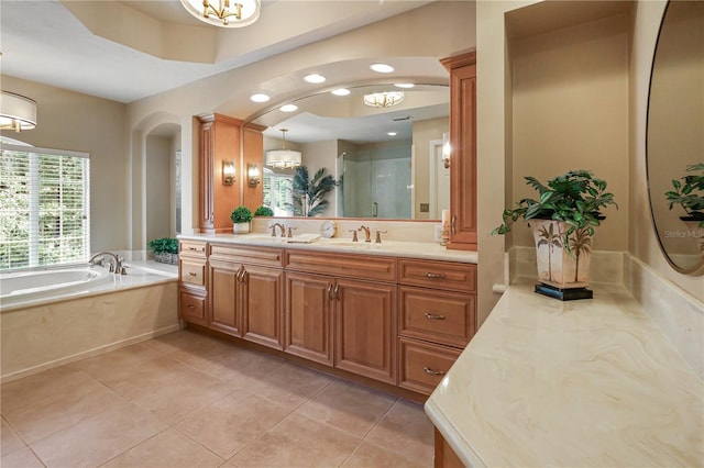 4515 SW 97th Ter, Gainesville, FL 32608 - bathroom featuring tile patterned floors, a garden tub, vanity, a stall shower, and recessed lighting